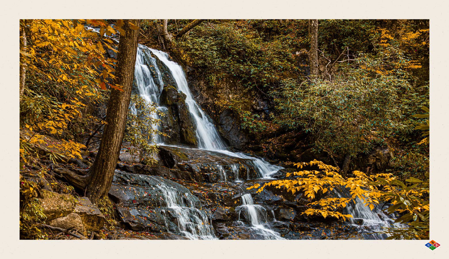 Waterfall in a lush landscape in the mountains