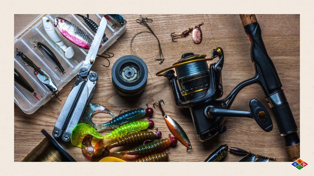 A photograph of assorted fishing tools on a table.