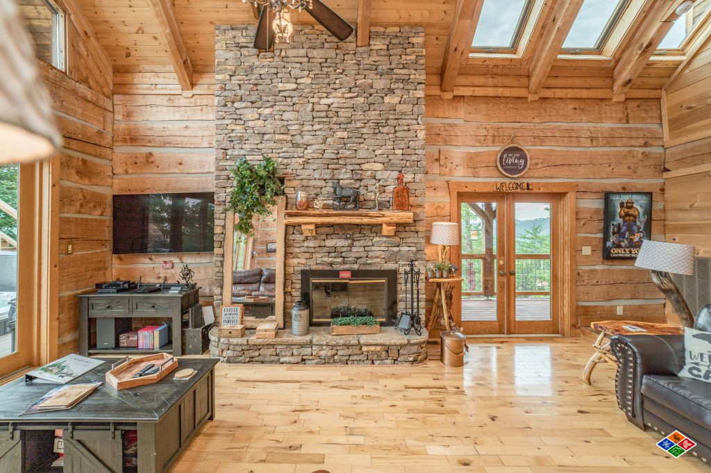 A floor-to-ceiling stone fireplace in the living room at Cielito Lindo