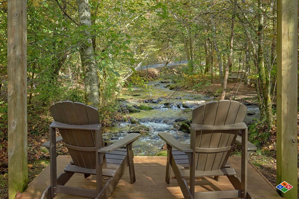 chairs on a deck at creeksong cabin