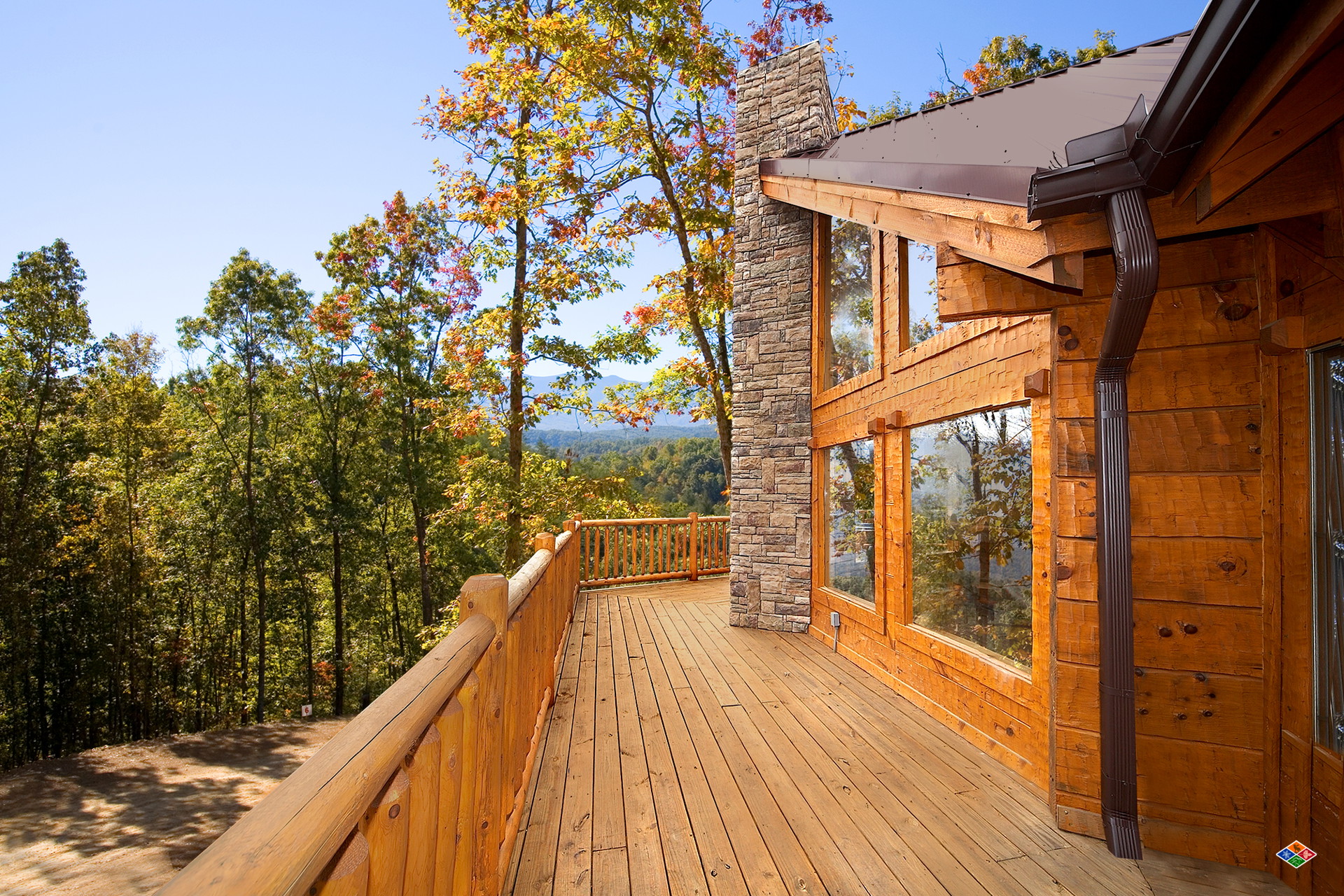 Wrap-around deck at Silvercreek looking out to the Smoky Mountains in autumn